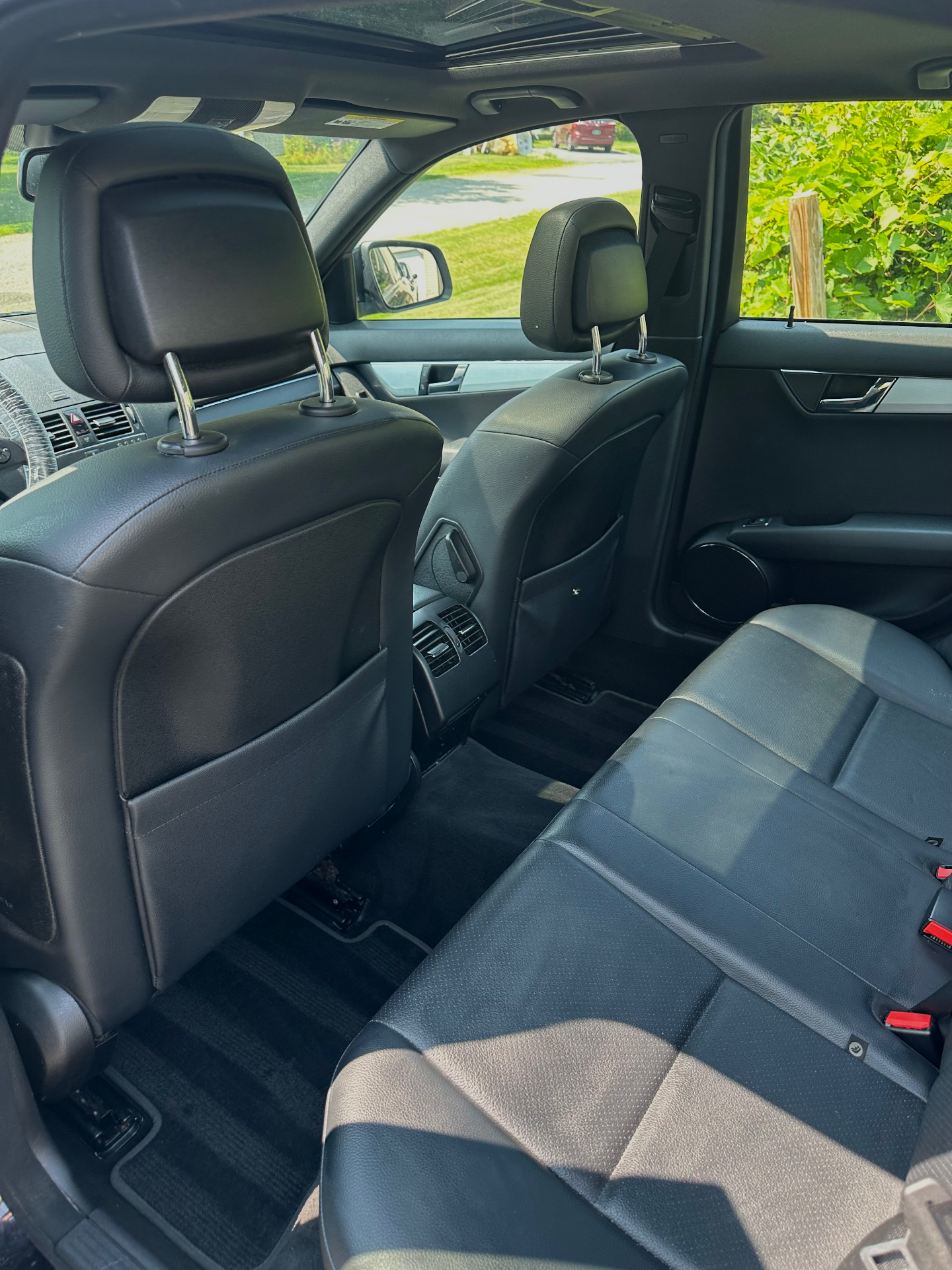 Mercedes-Benz C-Class rear interior after full detail with fresh carpet stripes